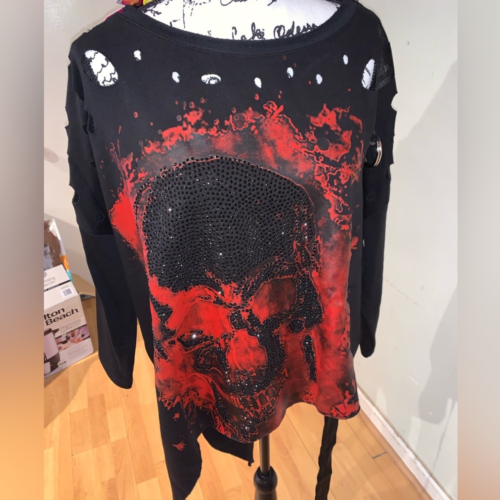 Size XS Skull embellished sweatshirt. Lots of details in video posted
